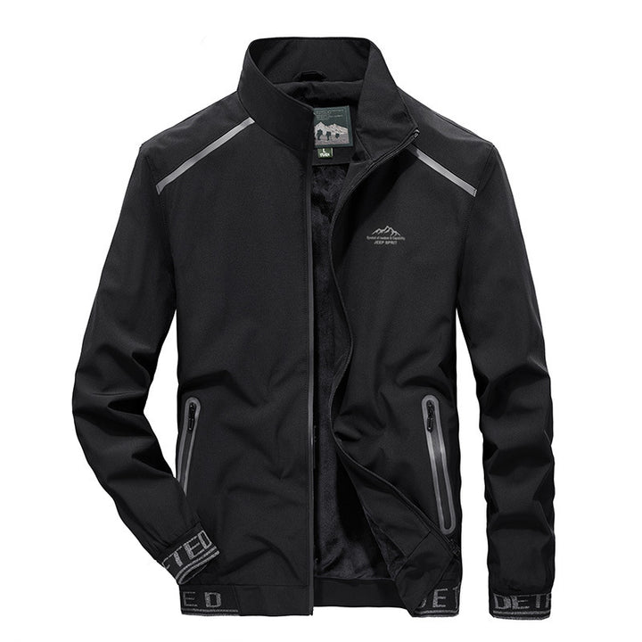 Herren Performance-Softshelljacke mit wärmender Fleecefutter, wind- und wasserabweisender Membran und reflektierenden Akzenten Drune