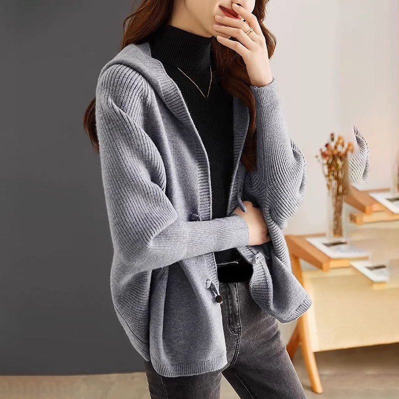 Damen kuschelige Strickjacke mit Kapuze und leicht oversized Schnitt Drune