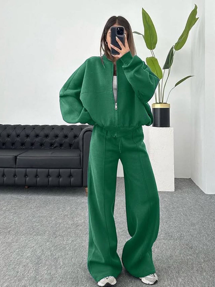 Damen sportive Oversize-Fleecejacke mit diagonaler Reißverschluss-Optik und weit geschnittener High-Waist-Jogginghose Drune