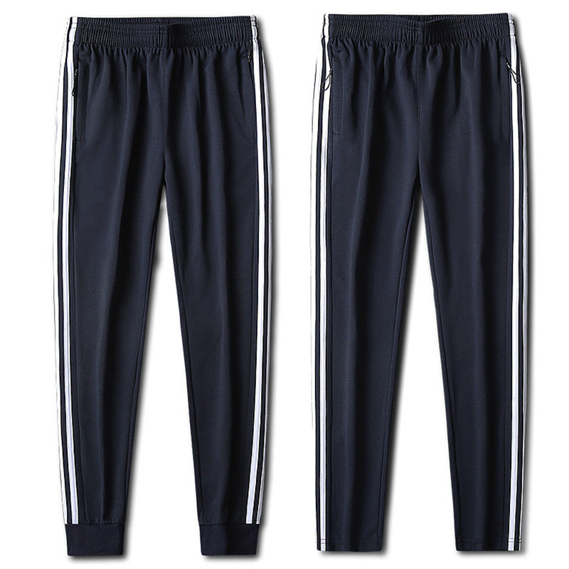 Herren Slim-Fit Trackhose mit seitlichen Kontraststreifen, Reißverschlusstaschen und elastischem Bund Drune