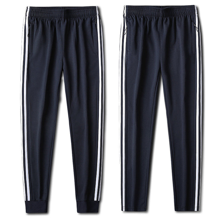 Herren Slim-Fit Trackhose mit seitlichen Kontraststreifen, Reißverschlusstaschen und elastischem Bund Drune