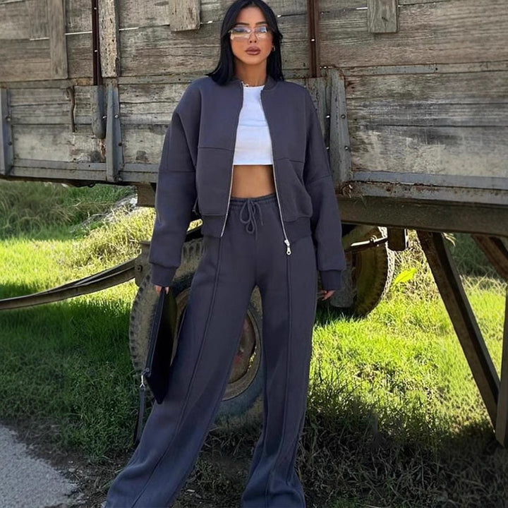 Damen sportive Oversize-Fleecejacke mit diagonaler Reißverschluss-Optik und weit geschnittener High-Waist-Jogginghose Drune