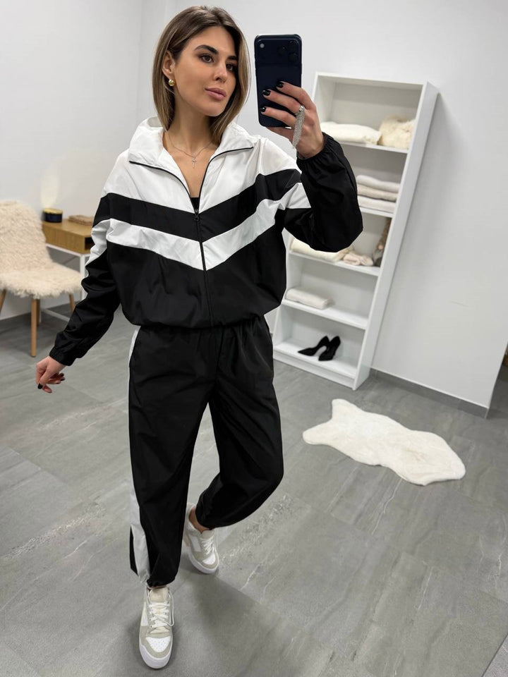 Damen retro Nylon-Trainingsanzug mit Kapuzen-Zipjacke und weiter hochgeschnittener Hose Drune