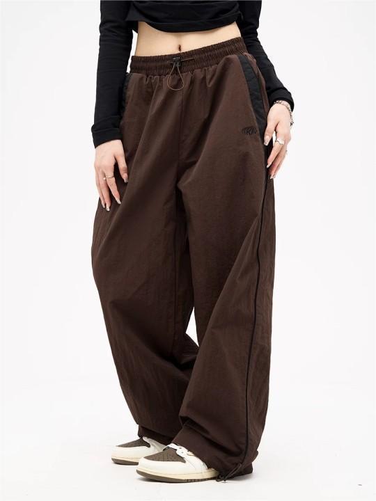 Damen nan weite Trackhose mit Kontrastpaspel, elastischem Bund und Oversize-Schnitt Drune