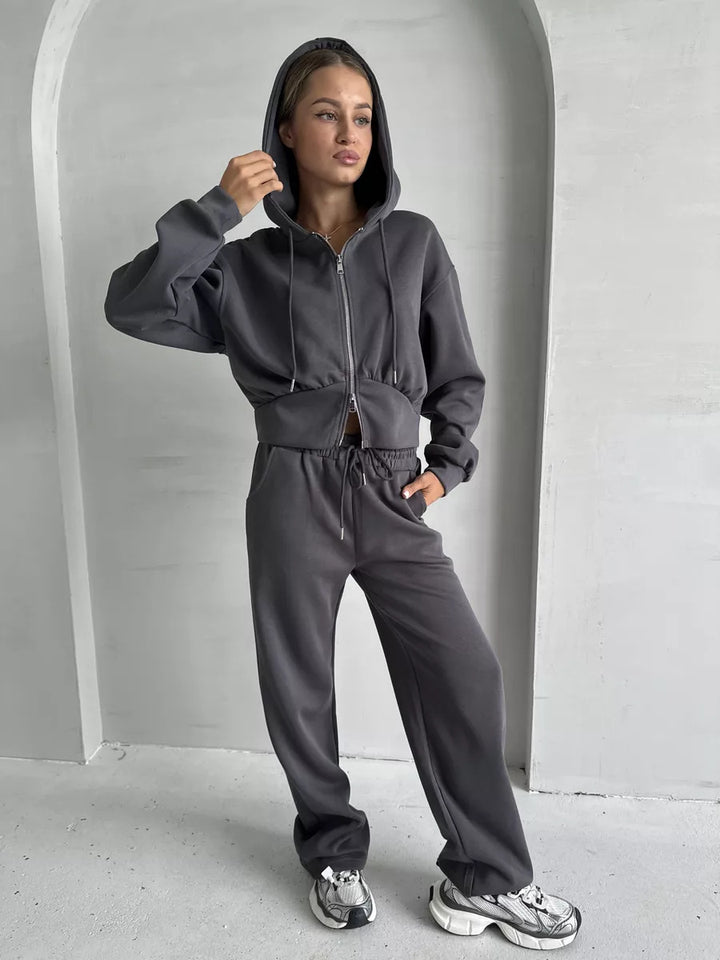 Damen gekürzte Zip-Kapuzenjacke mit formender Taillennaht und relaxed High-Waist Loungehose Drune