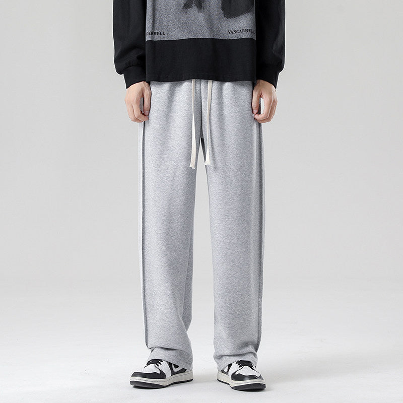 Herren weite Jogginghose im Oversize-Schnitt mit Seitenstreifen, Kordelzug & Fleecefutter Drune