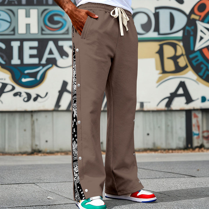 Herren Weite Snap-Trackhose mit Tunnelzug, seitlicher Bandana-Blende und Druckknopfleiste Drune