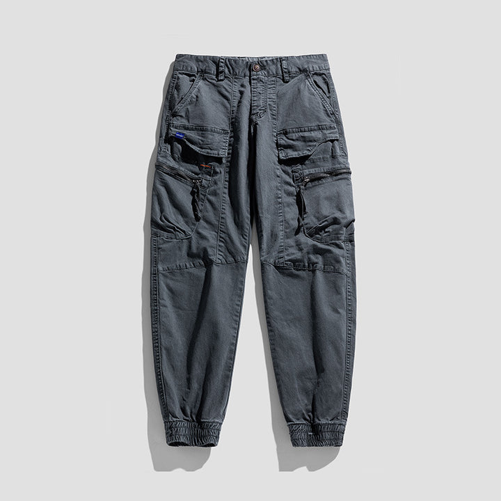 Herren Multifunktionale Cargo-Jogginghose im Tactical-Canvas-Stil mit Knie‑Paneelen, Reißverschluss‑ und Klappentaschen Drune