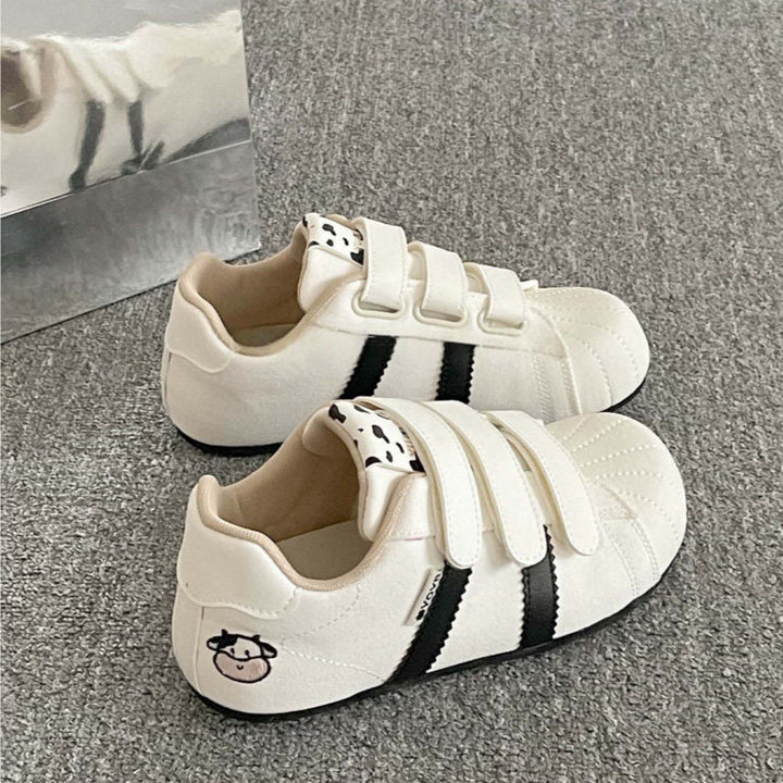 Damen Sneakers mit praktischem Klettverschluss und stylischen Tierapplikationen Drune