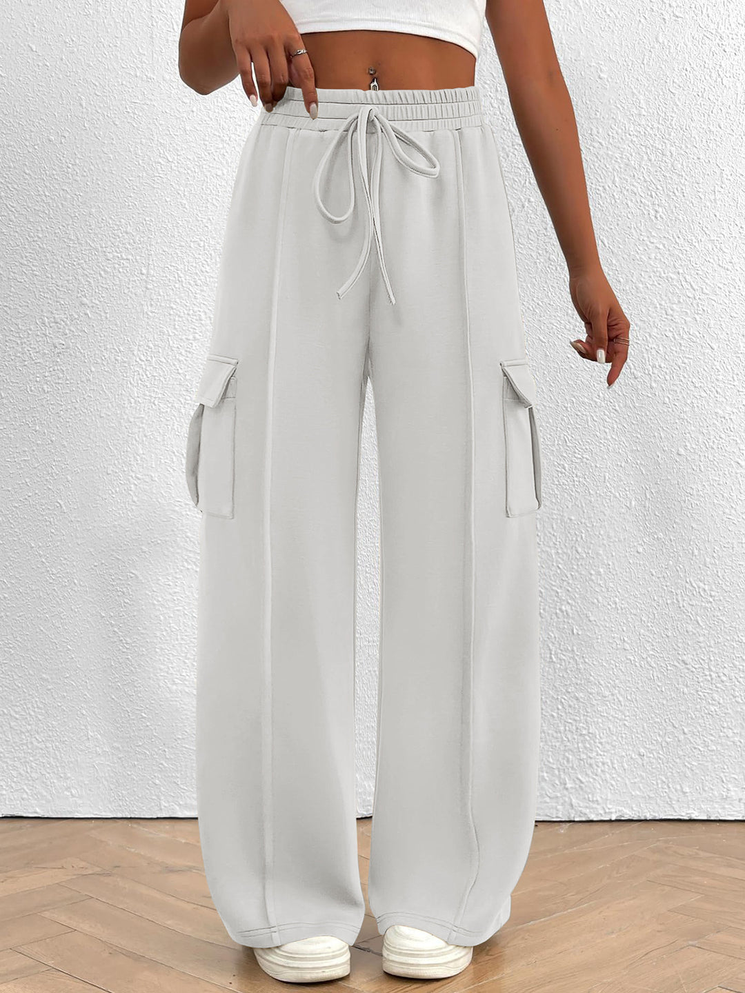 Damen Weite Cargo-Loungehose mit Tunnelzugbund und aufgesetzten Pattentaschen Drune