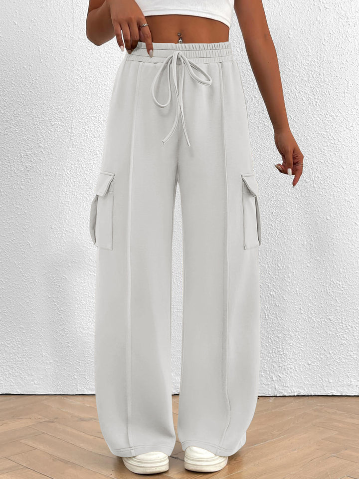 Damen Weite Cargo-Loungehose mit Tunnelzugbund und aufgesetzten Pattentaschen Drune