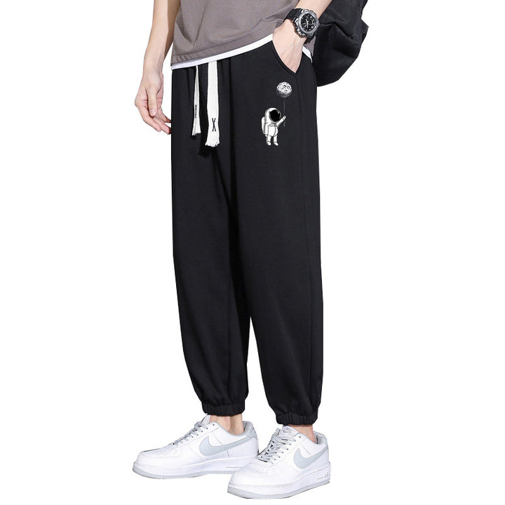 Herren Lockere Jogginghose mit Astronauten-Print, Kordelzugbund und elastischen Saumbündchen Drune