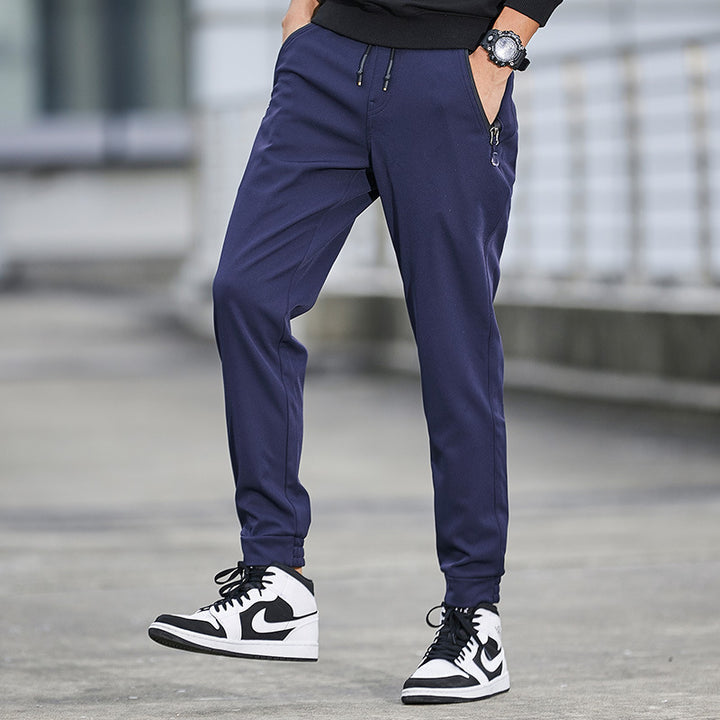 Herren Technische Softshell-Jogginghose mit wasserabweisender Membran, Reißverschlusstaschen und elastischem Kordelbund Drune