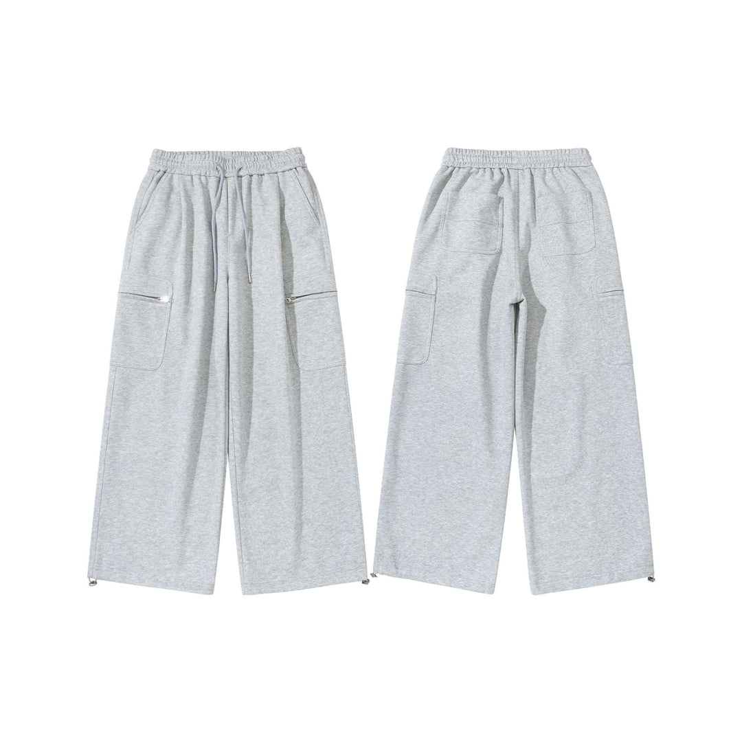 Damen Weite Cropped-Sweathose mit Tunnelzug, Cargo-Taschen und Reißverschluss-Details Drune