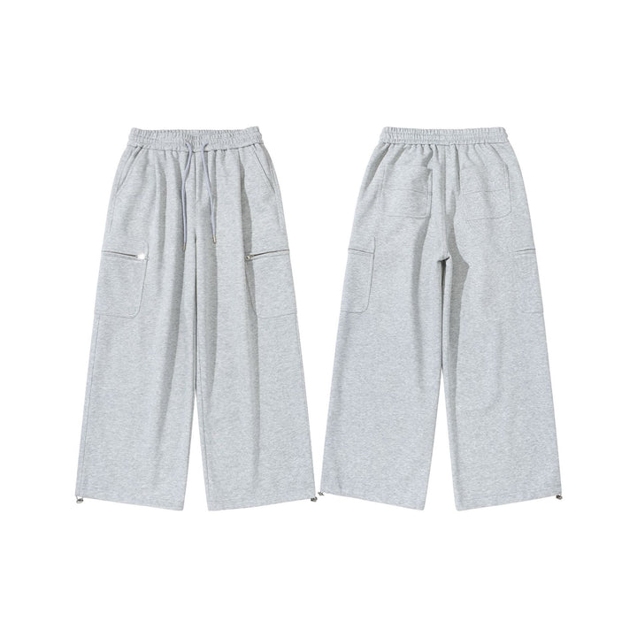 Damen Weite Cropped-Sweathose mit Tunnelzug, Cargo-Taschen und Reißverschluss-Details Drune