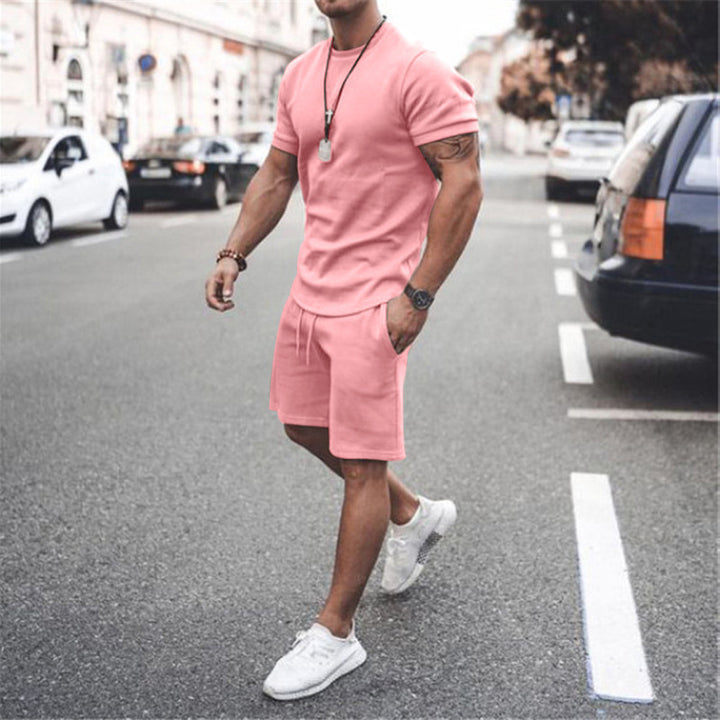 Herren nan figurbetontes Kurzarmshirt mit verstärkter Schulternaht und elastischer Kordelzug-Bermuda aus Stretchjersey Drune