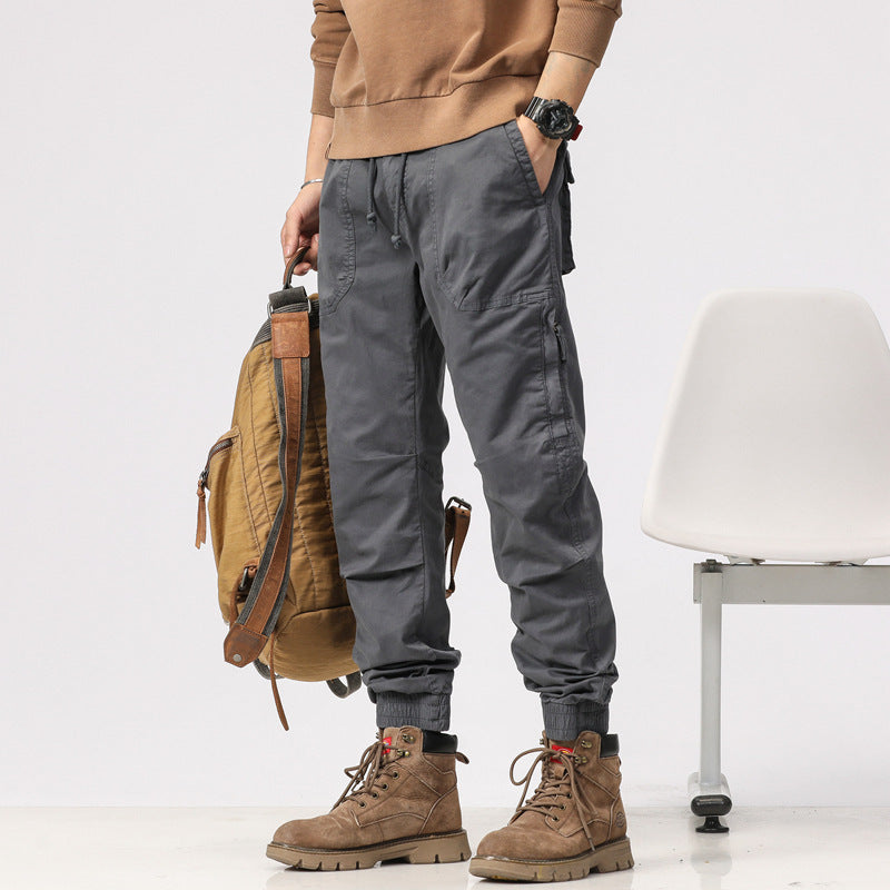 Herren Field-Joggerhose im Military-Workwear-Look mit Ziernähten, aufgesetzten Utility-Taschen und Kordelbund Drune