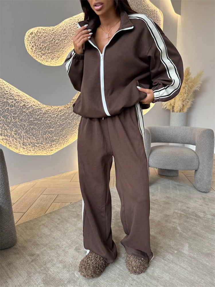 Damen weiches Oversize-Zweiteiler Trainingsset mit Reißverschlussjacke und weiter hochgeschnittener Jogginghose mit Kontraststreifen Drune