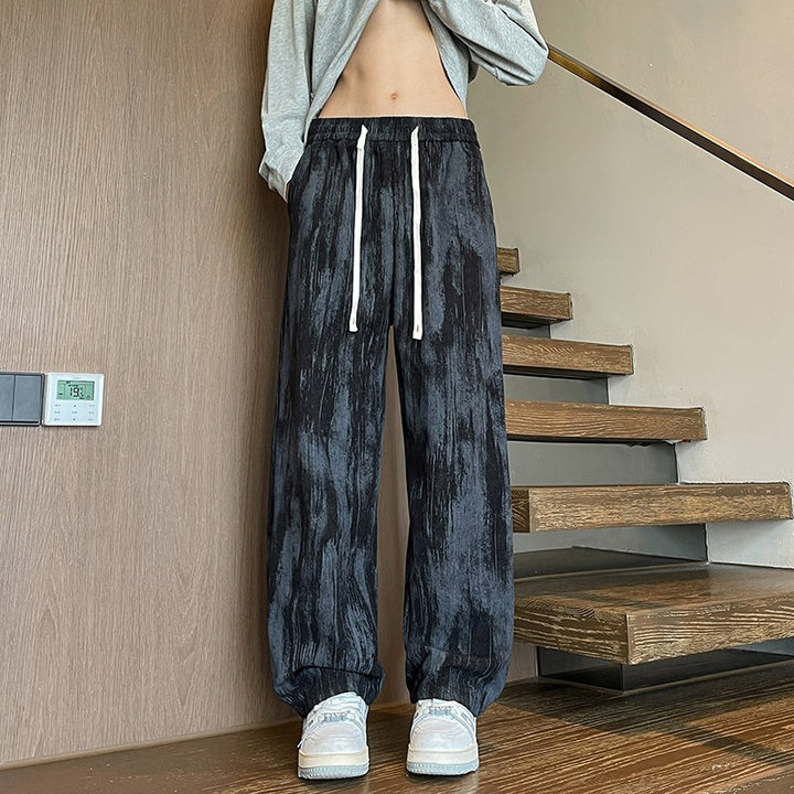 Herren Weit geschnittene Loungehose mit Marmorprint aus strukturiertem Jersey Drune
