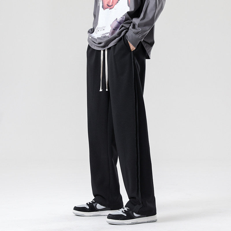 Herren weite Jogginghose im Oversize-Schnitt mit Seitenstreifen, Kordelzug & Fleecefutter Drune