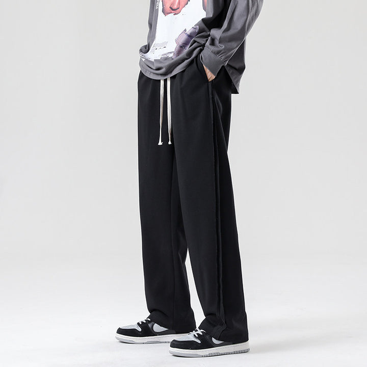 Herren weite Jogginghose im Oversize-Schnitt mit Seitenstreifen, Kordelzug & Fleecefutter Drune