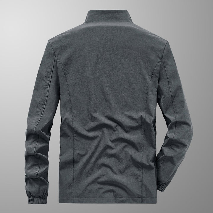 Herren Softshell‑Outdoorjacke mit Stehkragen, wind‑ und wasserabweisender Membran & reflektierendem Bruststreifen Drune