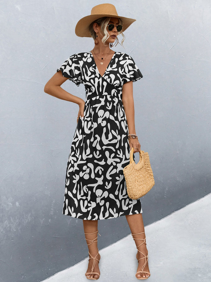Damen Wickelkleid mit floralem Muster und eleganter Raffung Drune