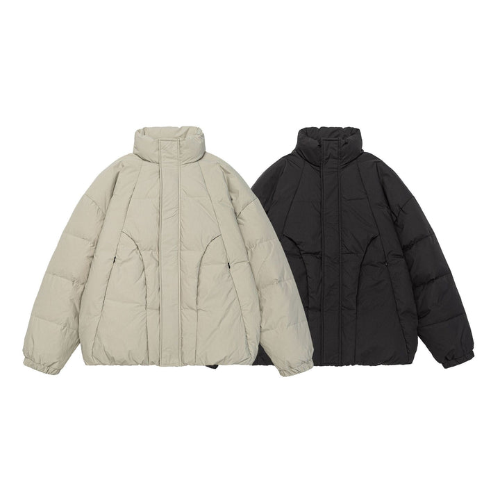 Damen Voluminöse Steppjacke mit hohem Stehkragen und winddichter Frontblende Drune