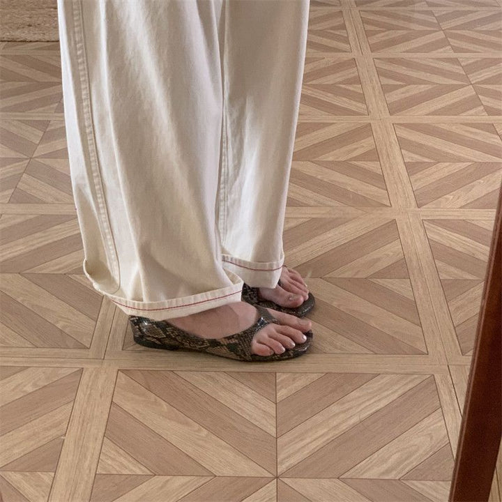 Damen Flache Slip-On-Pantoletten mit Zehenring und weichem Komfortfußbett Drune
