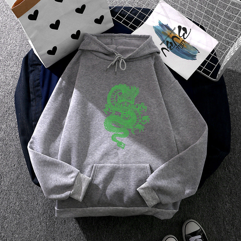 Unisex nan Kapuzenpullover mit detailreichem Drachenmotiv, Oversize‑Schnitt und Kängurutasche Drune