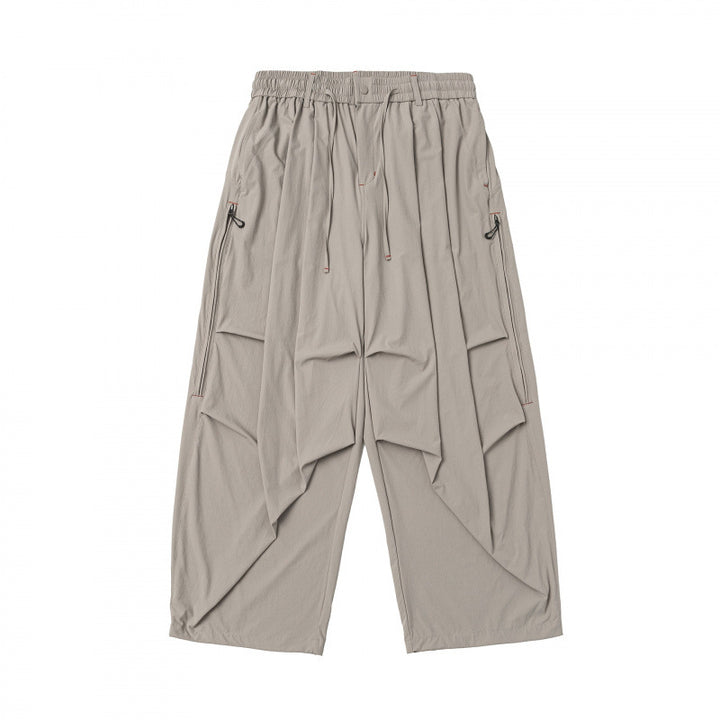 Unisex Weitgeschnittene technische Cargo-Hose mit Gummibund, Kordelzug und Reißverschlusstaschen Drune