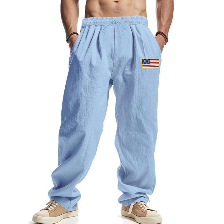 Herren Locker sitzende Freizeit-Hose im Leinen-Look mit elastischem Bund, Kordelzug & Flaggenpatch Drune