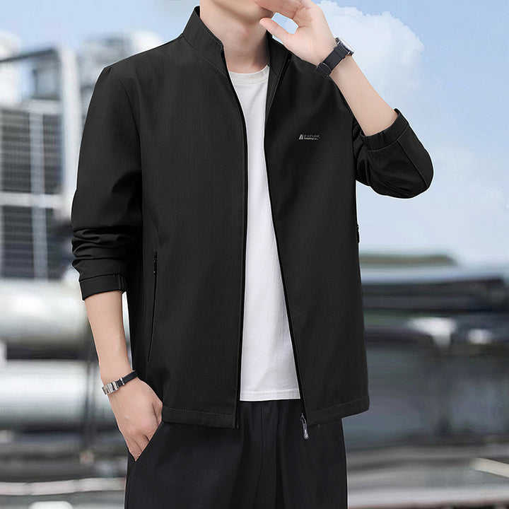 Herren Leichte Alltags-Softshelljacke mit Stehkragen, windabweisender Membran und Reißverschlusstaschen Drune