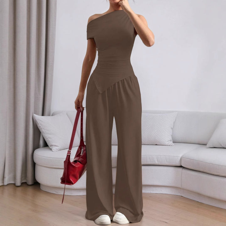 Damen stylischer Jumpsuit mit asymmetrischem Design und Taschen Drune