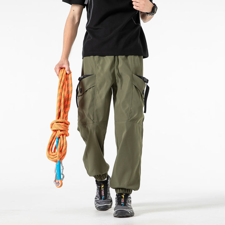 Unisex Weite Technical-Cargo-Jogginghose mit verstellbarem Tunnelzug, großen Klapptaschen und elastischem Knöchelabschluss Drune