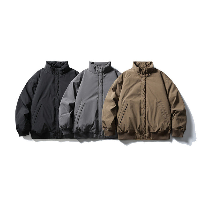 Unisex Kastig geschnittene wattierte Bomberjacke mit hohem Stehkragen und verdeckter Frontblende Drune