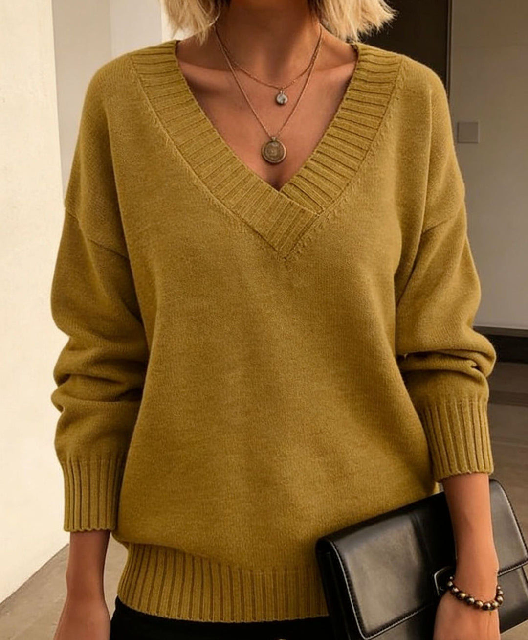 Damen Feinstrickpullover mit tiefem V-Ausschnitt und überschnittener Schulter Drune