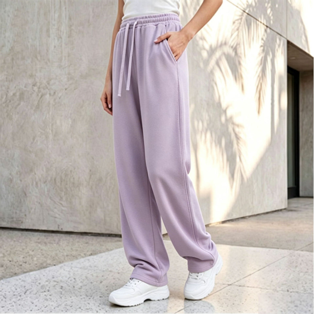 Damen nan weite Loungepalazzo-Hose mit hohem Komfortbund, Kordelzug, seitlichen Eingrifftaschen und dekorativer Seitennaht Drune