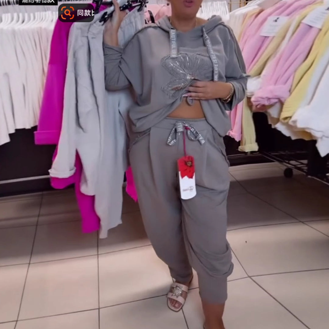 Damen nan entspanntes Lounge-Set mit Blüten-Pailletten-Hoodie, Kordelzug und weiter Bundfaltenhose Drune