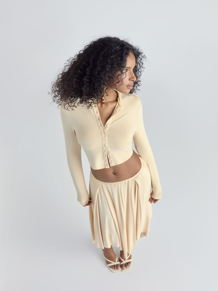 Damen Cropped-Cardigan mit Perlmuttknöpfen und asymmetrischem Zipfel-Midirock Drune