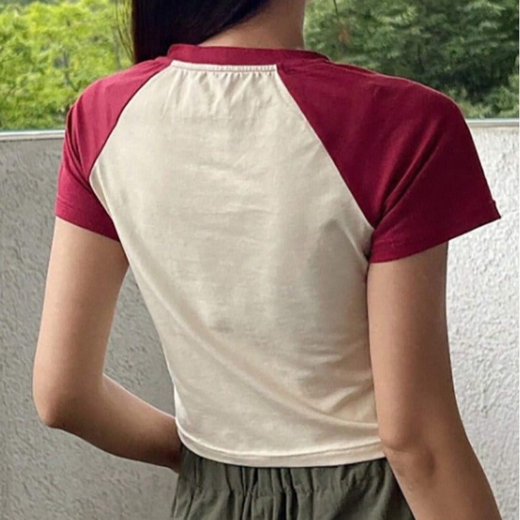 Damen Raglan-Crop-Shirt mit auffälligem Sternmotiv Drune