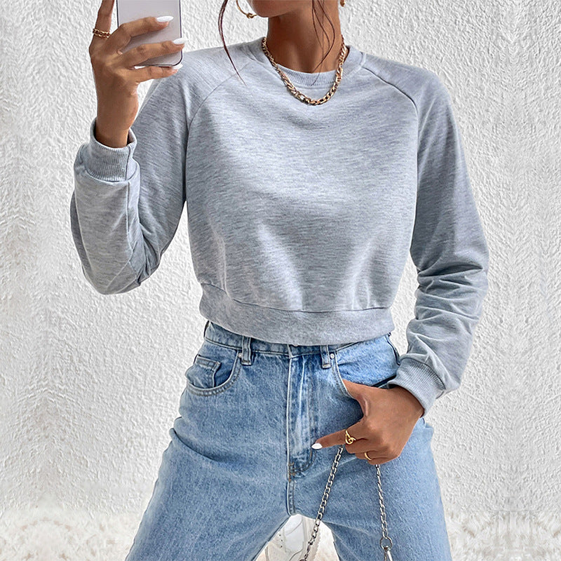 Damen Kurzes minimalistisches Sweatshirt mit Raglanärmeln und geripptem Saum Drune