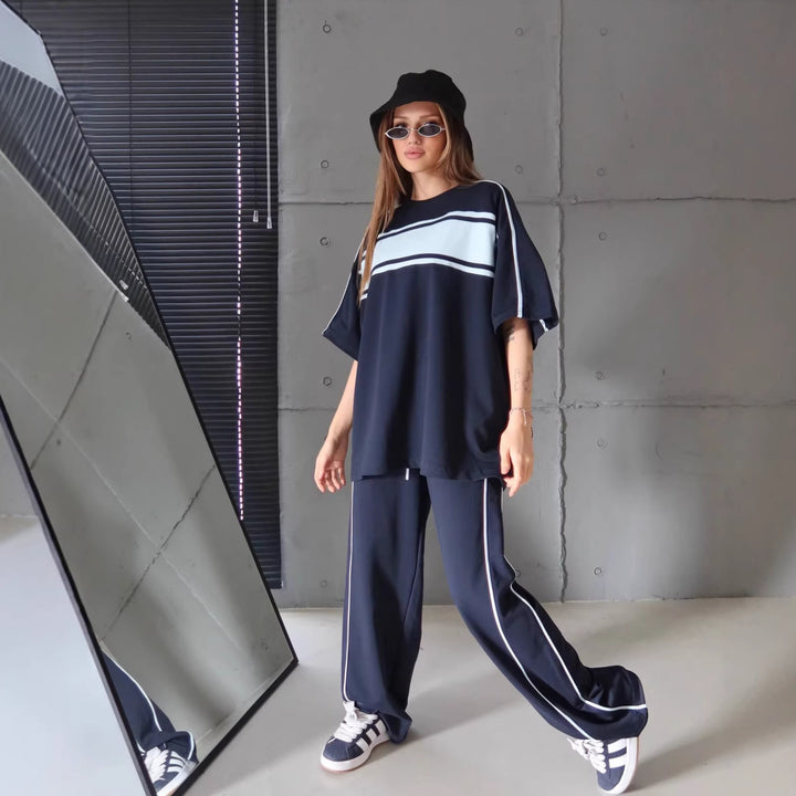 Damen stylisches Sportanzug-Set mit weitem Schnitt und kontrastierenden Streifen