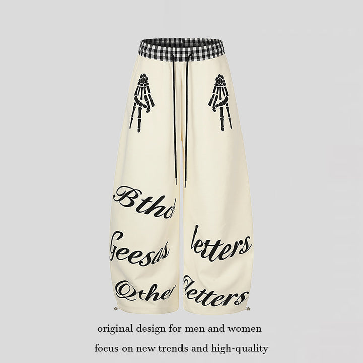 Damen Extraweite Palazzo-Sweathose mit Karo-Komfortbund, Tunnelzug und Skelett-Print Drune