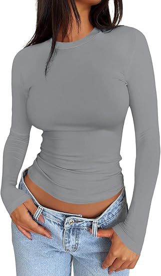 Damen Körpernahes Langarmshirt im Cropped-Look mit verlängerten Ärmeln und Daumenloch Drune