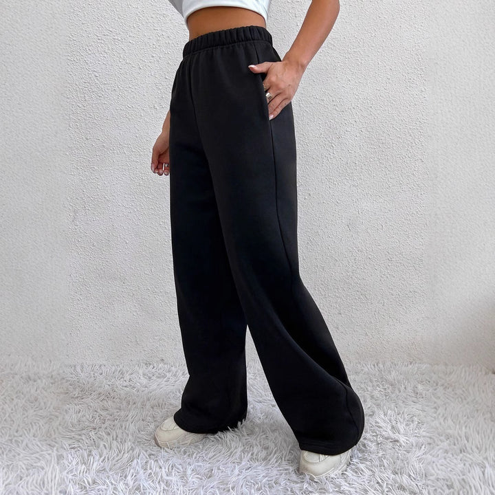 Damen nan weite Loungehose aus French Terry mit hohem Komfortbund, seitlichen Eingrifftaschen und fließendem Bein Drune