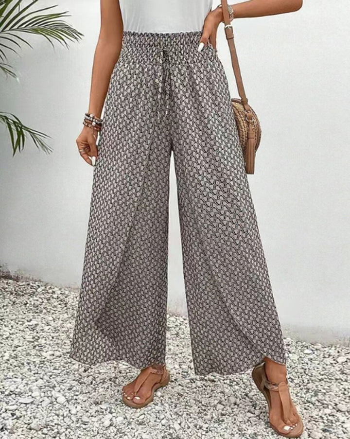 Damen nan weite Sommer-Palazzohose mit gerafftem Komfortbund, fließender Beinweite und geometrischem Allovermuster Drune