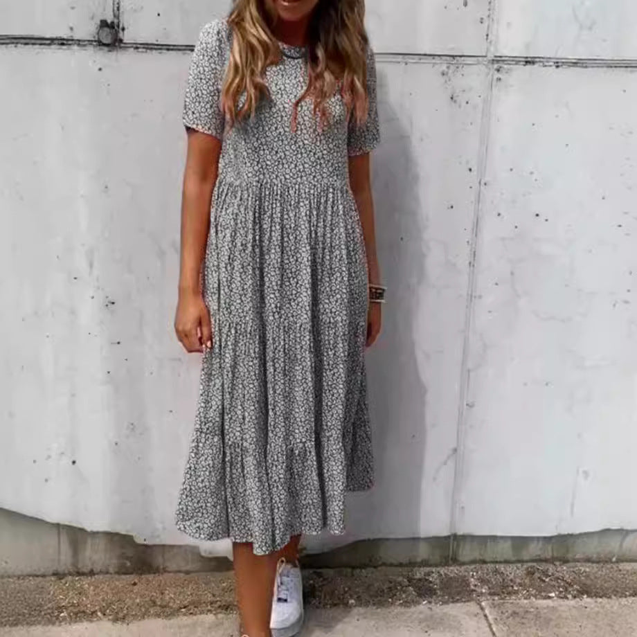 Damen nan geblümtes gekrepptes Midikleid mit geraffter Empire-Taille, kurzen Ärmeln und stufigem Volantrock Drune