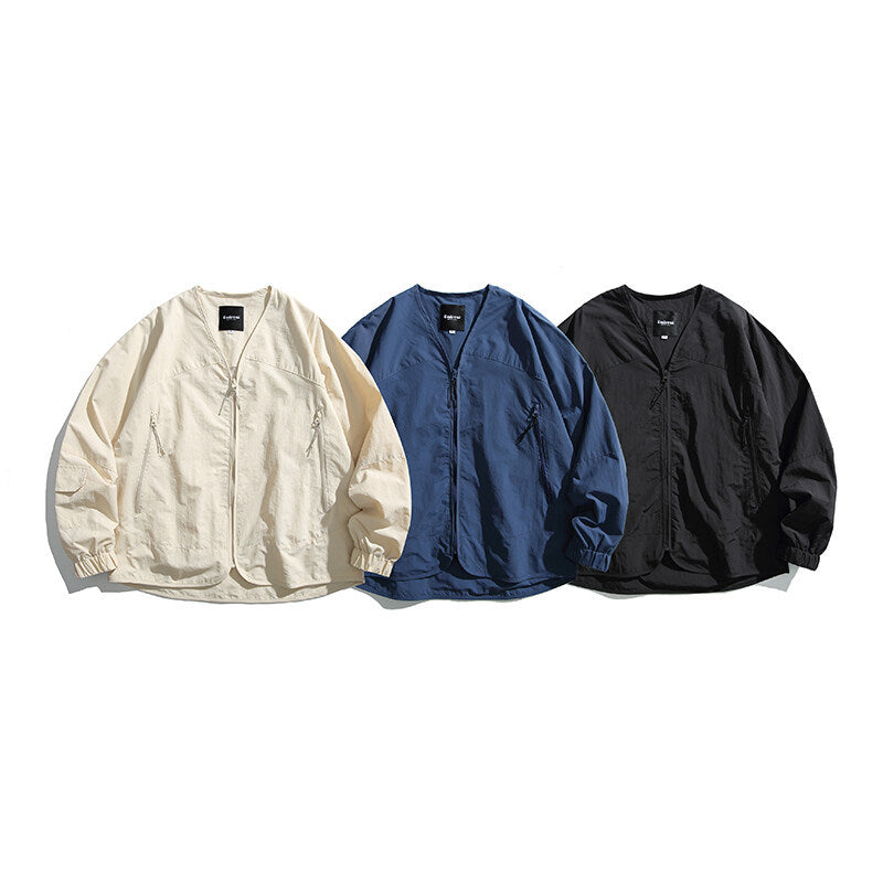Unisex Leichte Oversize‑Überhemdjacke aus technischem Nylonmix mit V‑Ausschnitt und Reißverschlusstaschen Drune