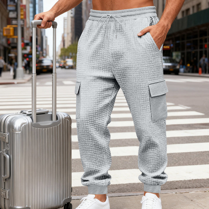 Herren Cargo-Jogginghose mit markanter Waffelstruktur, elastischem Bund und großen Klappentaschen Drune